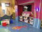 TV and play area in the child watch center.