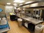 Commercial grade kitchen that is located behind the snack bar that can service the large meeting room, small meeting room and patio.